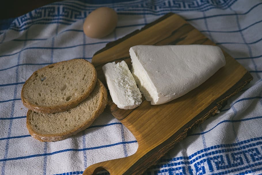 white cheese, cheese, cottage cheese, goat cheese, products, dairy, egg, bread, kitchen board, wooden, napkin plate