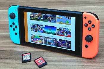 nintendo switch, turned, brown, surface, two, game cartridges, nintendo, console, game, video, play