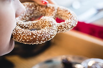 pretzel, sesame seeds, Eating, close up, pastry, food, snack, close-up, breakfast, donut, baked