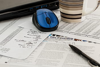 blue, black, cordless, computer mouse, ballpoint pen, table, tax, forms, income, business, paperwork