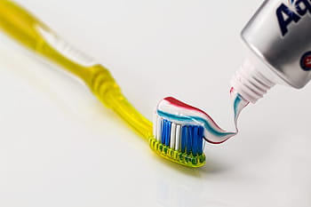 yellow plastic toothbrush, toothbrush, toothpaste, dental care, clean, dentist, dental hygiene, tooth brush, teeth, oral hygiene, healthcare