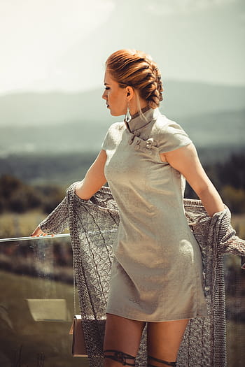 woman, standing, wearing, grey, cap-sleeved mini dress, glass fence, people, fashion, beauty, gladiator, dress