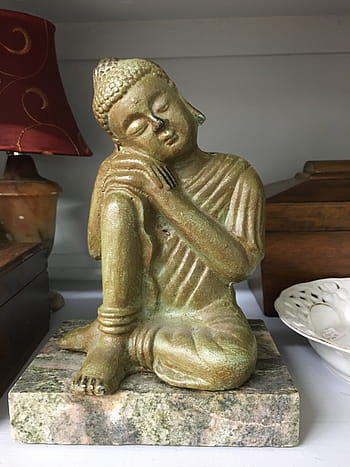 sleeping, seated, buddha statue