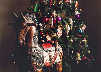 shallow, focus photography, wooden, ride-on horse, christmas tree, christmas, tree, ball, lights, horse, pony