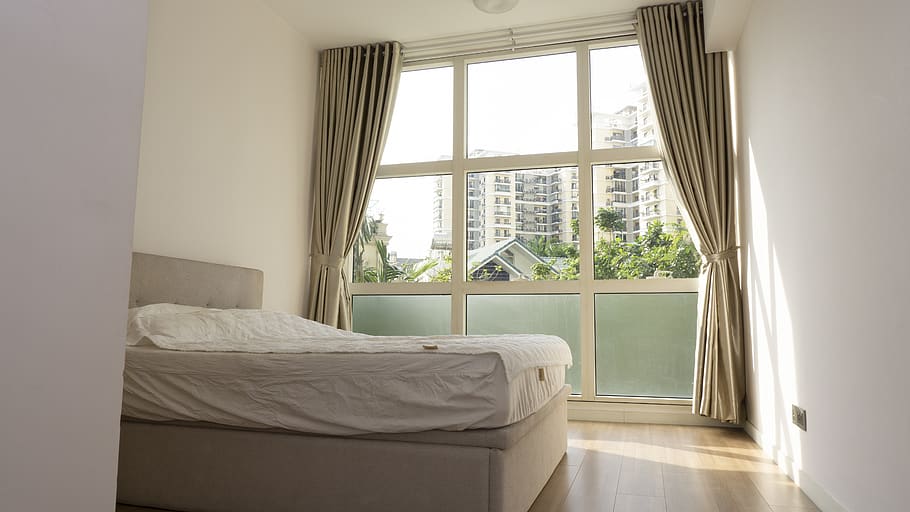 furniture, room, interior design, indoors, electronics, wall, living room, entertainment center, bedroom, shelf, table