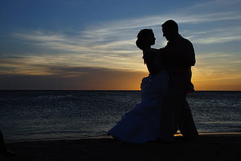 silhouette, dancing man, woman, shore, sunset, couple, wedding, married, marriage, romantic, background