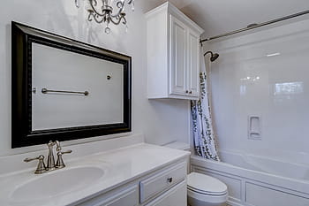 room, indoors, inside, family, house, bathroom, faucet, mirror, cabinet, toilet, shower