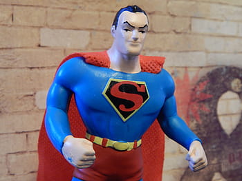 closeup, superman scale model, superman, superhero, toy, caped, cape, cartoon, character, strength, power