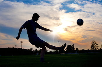 silhouette photography, man, kicking, ball, soccer, sunset, sport, player, football, play, sports