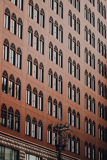 brown painted building, brown, building, architecture, infrastructure, facade, window, residential building, apartment, building exterior, city life