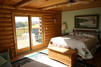 white, black, floral, bedspread, inside, room, master bedroom, bed, logs, cabin, log home