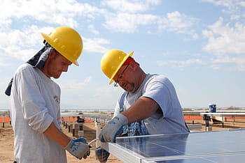 two, men, yellow, hard, hat helmets, installing, solar, panels, daytime, two man, construction sites