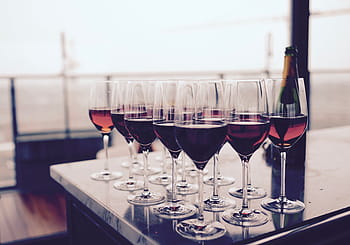 clear wine glasses, wine, glasses, filled, wines, drinks, dining, restaurant, bar, party, red wine