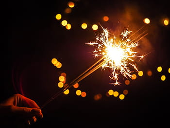 osoba blesk prskavka, noc, ohňostroj, Dovolená, oslava, Vánoce, bokeh, temný, světla, oheň, jiskra