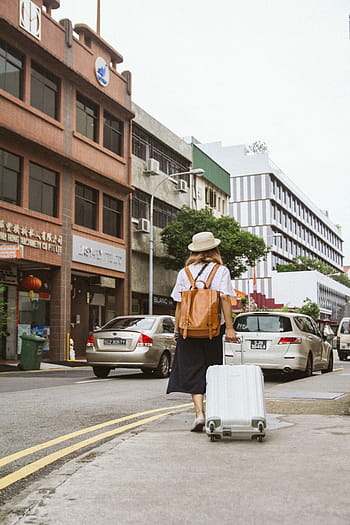 woman, pulling, white, hardside luggage, urban, city, people, travel, adventure, baggage, bag