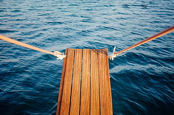 brown, wooden, dock, surrounded, body, water, near, wood, plank, ocean, sea