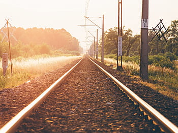 grey train railway, trail, rail, near, post, golden, hour, train tracks, railroad, railway, transportation
