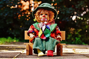 clown doll, sitting, bench, doll, clown, sad, bank, sit, colorful, sweet, funny