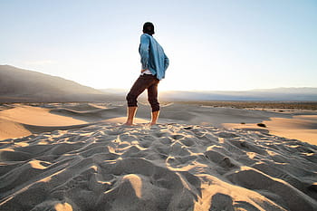 person, standing, sand, hands, hips, people, man, fashion, sunset, sunny, desert