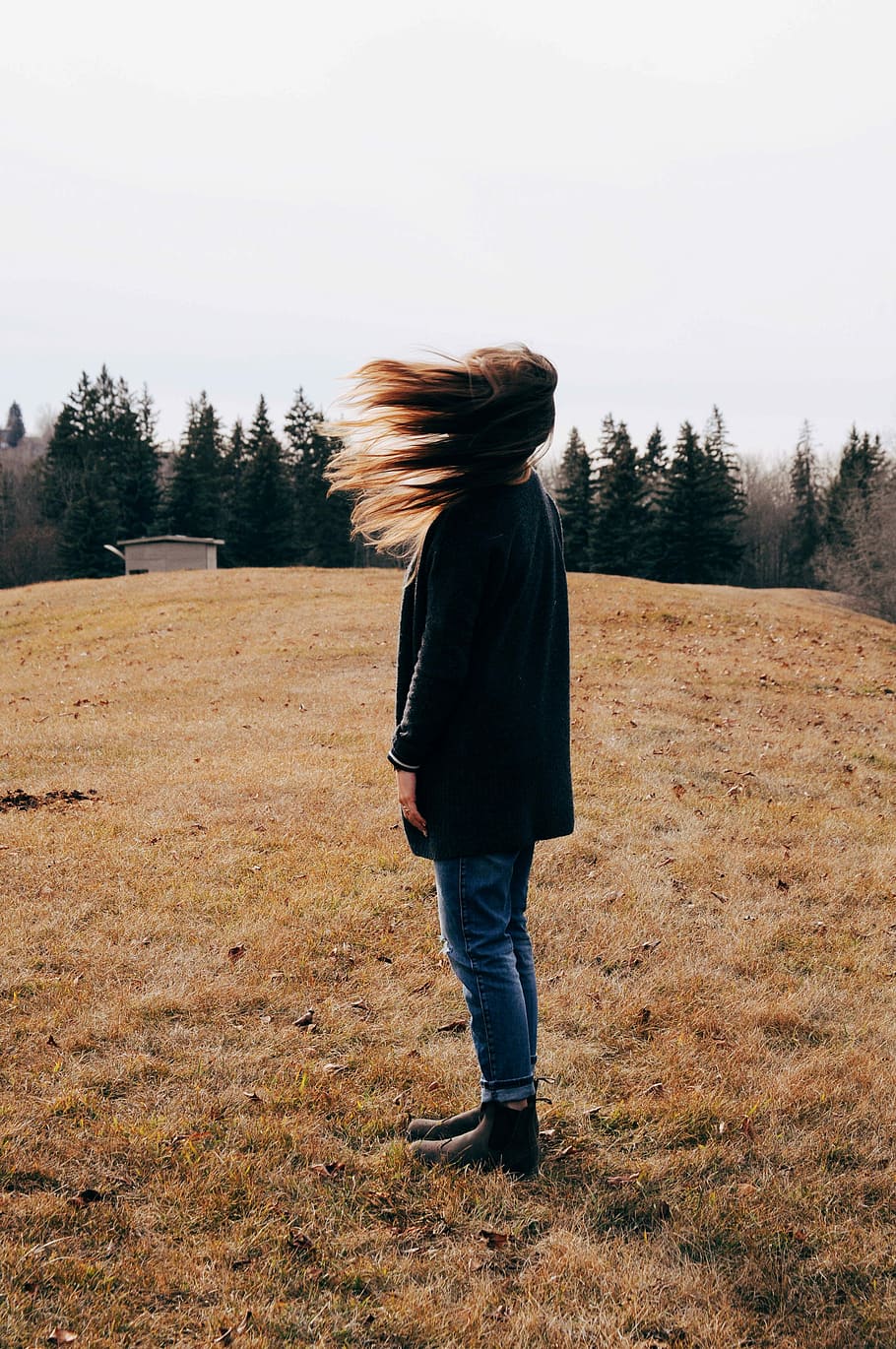 woman, black, shirt, standing, grass field, daytime, woman in black, black shirt, grass, field, autumn