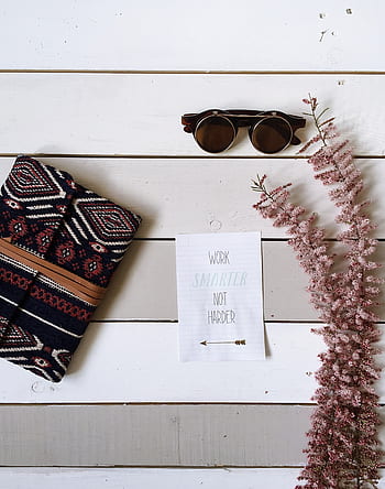 eyeglasses, wallet, flower, paper, quote