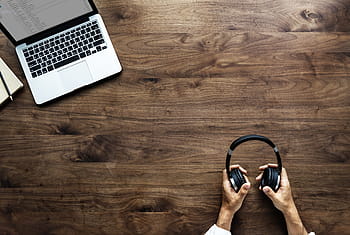 person, holding, black, headphones, brown, wooden, surface, aerial, background, blog, blogger