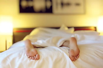white bed blanket, sleeping, tired, bed, feet, bedroom, indoors, morning, people, one Person, relaxation