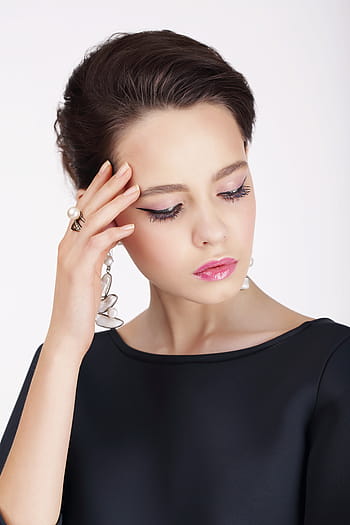 woman, wearing, black, boat neckline, top, holding, head, fashion, model, black dress, jewelry