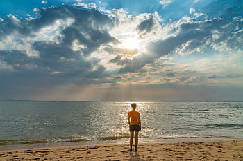fotografie, osoba, stojící, pobřeží, obložení, oceán, během dne, žena, pláž, písek, západ slunce