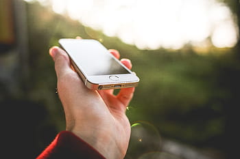 iPhone 5, 5s, luces solares, iPhone 5s, ORO, teléfono móvil, teléfono inteligente, tecnología, mano humana, teléfono, al aire libre