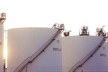 two, white, distillation towers, stairs, plantation, building, industrial, oil, tank, railing, steps