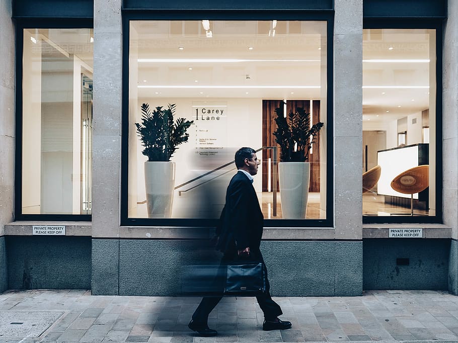 man crossing shop, man, crossing, shop, people, men, business, color Image, editorial, blurred motion, walking