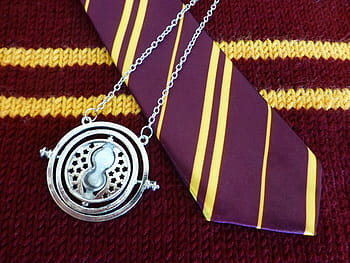 silver-colored pendant, necktie, harry potter, gryffindor, house colours, gold, maroon, red, school tie, scarf, time turner