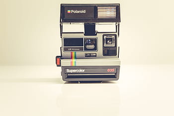 white, black, polaroid camera, polaroid, camera, photography, technology, retro styled, old-fashioned, indoors, day