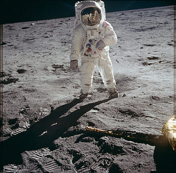 Astronaut, moon, lunar surface, space suit, NASA, American flag, space exploration, moon landing, lunar landscape, space mission, astronaut on moon