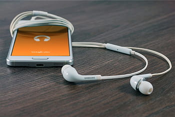 white, samsung android smartphone, table, samsung, smartphone, ear, earphones, android, mobile, google, cell phone
