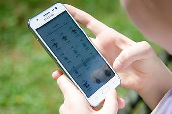 woman, holding, white, samsung android smartphone, pokemon go, location, virtual, human Hand, mobile Phone, technology, telephone
