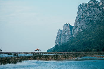 body, water, mountain background, mountain, highland, hill, cliff, sea, cottage, trees, plant