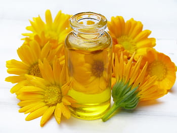 oil, vial, glass, calendula, marigold, flowers, orange, skin, skin care, body care, wellness