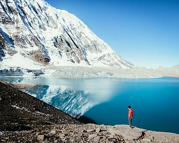 mountains, landscape, sky, clouds, man, ocean, guy, reflect, reflection, rocks, snow