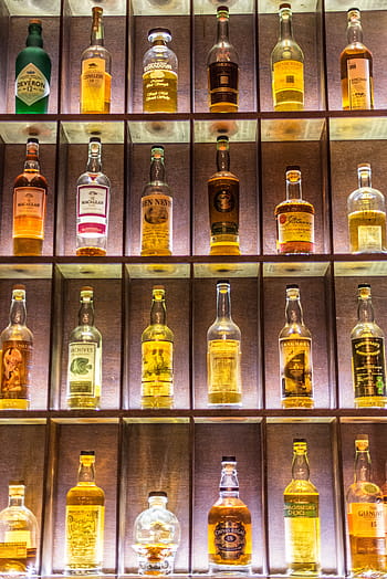 liquor bottle display rack, drink, alcohol, booze, bottles, glass, alcoholic, beverage, bar, alcoholic drinks, party