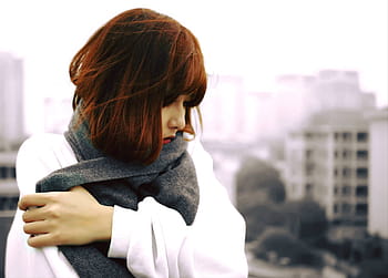 woman, wearing, white, jacket, holding, black, scarf, long, sleeved, shirt, gray