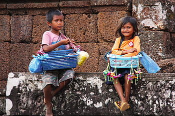 two, boy, girl, sitting, concrete, wall, carrying, basket, goods, local, children