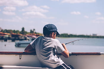 boy, holding, fishing rod, people, kid, child, fishing, boat, sailing, sky, outdoors