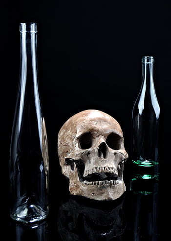 beige, skull, two, clear, glass bottles, death, glass, simplicity, dark, background, composition