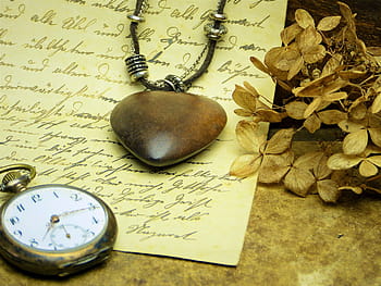 silver-colored pocket, watch, brown, heart pendant necklace, printer paper, heart, wood, clock, time, digits, letters