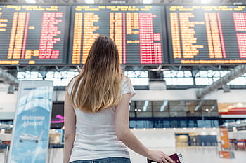 Young, woman, standing, flight, scoreboard, airport, aircraft, airline, airplane, arrival, billboard