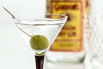 close-up photo, cocktail glass, white, wine, green, cherry, top, cocktail, martini, gin, drink