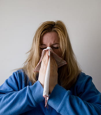 woman, sneezing, white, handkerchief, blow, blowing, nose, hand chief, grey, blond, female