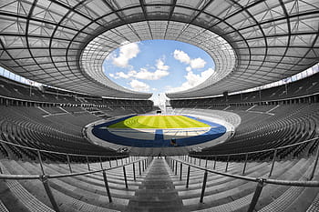 fish-eye view photograph, football stadium, olympic stadium, berlin, 1936, symmetrical, interior, color key, extreme long shot